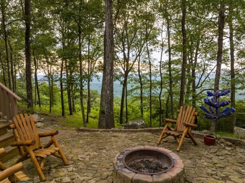 Gather around the fire pit as the sun sets—where mountain views meet cozy evening glow.