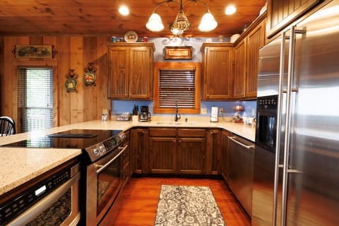 Well Stocked Kitchen. Stove is pointed towards the view which makes cooking pleasant on vacation.