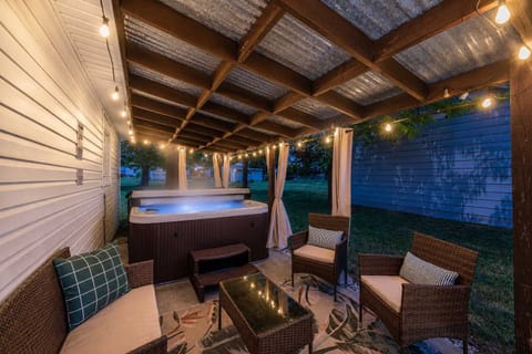 Private hot tub setup under cover, ideal for unwinding anytime