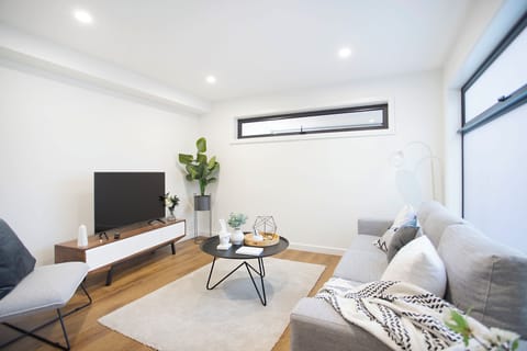 Relax in the entry level living room with TV