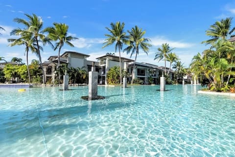 This lavish resort features superb amenities including multiple outdoor pools, a restaurant, day spa, and direct access to Four Mile Beach.