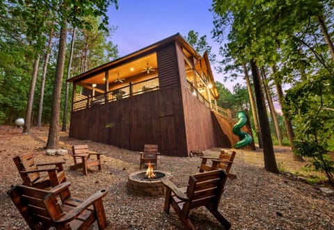 Gather around the fire pit in the evening, where the surrounding trees create a serene backdrop for your conversations.