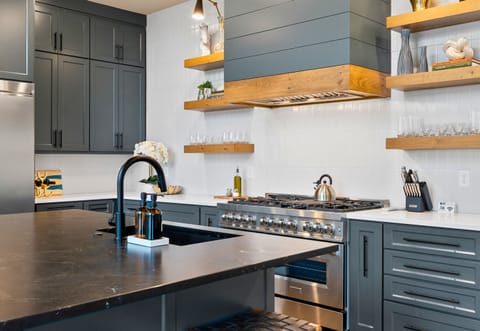 Step into our modern and fully-equipped kitchen, designed for both culinary enthusiasts and casual cooks alike.