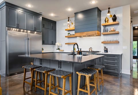 Enjoy the perfect blend of style and convenience in our well-appointed kitchen, ideal for preparing delicious meals.