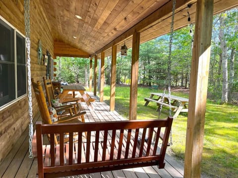 Hanging swing seat on the porch.