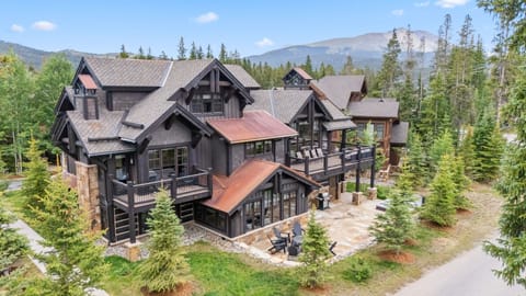 Welcome to Shock Hill, your new home away from home, featuring stunning views, greenery, and a patio with hot tub & fire pit for your enjoyment.