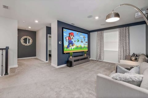 Movie room in loft with awesome 110" projector screen and theatre quality surround sound!