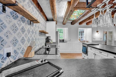 Fully equipped kitchen with modern appliances, ready for your culinary adventures.