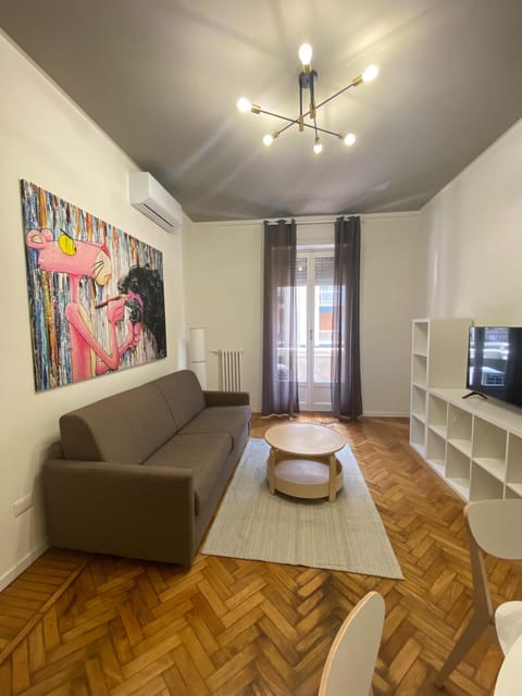 Deluxe Apartment | Living area | 43-inch flat-screen TV with satellite channels