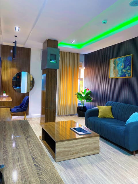 Executive Apartment | Living area | TV