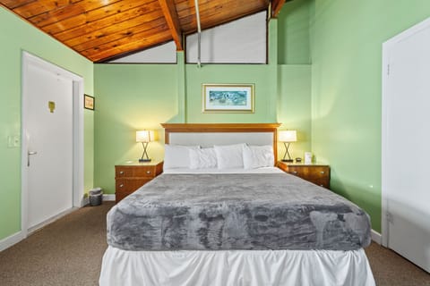 Room 10 is located on the 3rd floor of the Inlet Building. It has a king-size bed and a window overlooking the town.