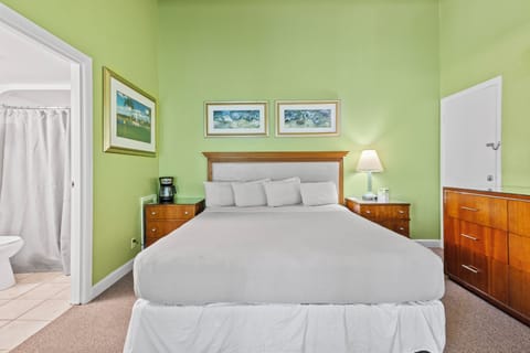 Room 11 is located on the 3rd floor of the Inlet Building. It has a king-size bed and a shared balcony with views of the Inlet and Ocean.