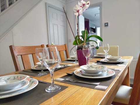 Dine in style perfect for intimate family or group meals w/ easy access kitchen.