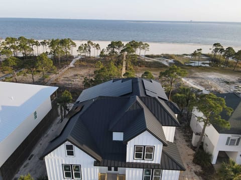 Aerial view of Solar Waves; private boardwalk to beach