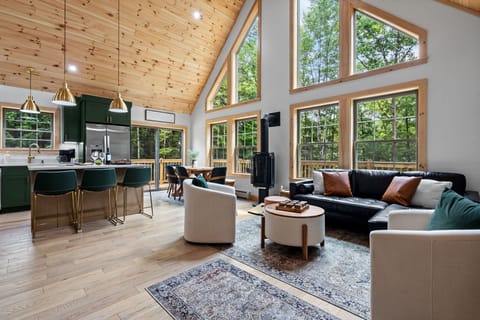 Bright & Airy Living Room - floor to ceiling windows bring the outdoors in