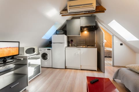 Apartment | Private kitchenette | Fridge, stovetop, cookware/dishes/utensils