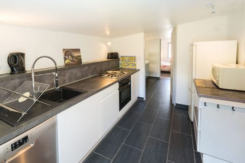 Apartment | Private kitchen | Fridge, stovetop, cookware/dishes/utensils