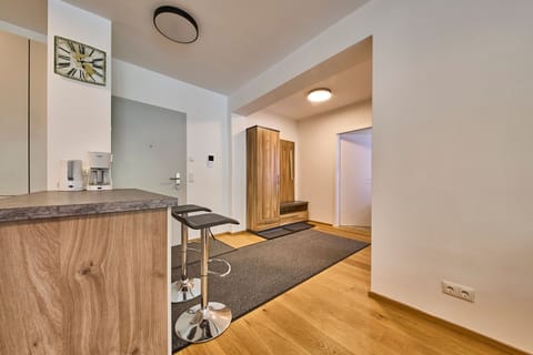 Classic Apartment, Balcony, Mountain View | Living area | 50-inch flat-screen TV with cable channels, heated floors