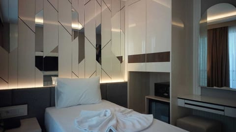 Standard Single Room | Premium bedding, free WiFi, bed sheets
