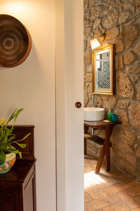 Triple Room, Garden View | Bathroom | Shower, hair dryer, towels, soap