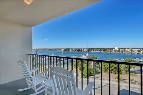 Step onto your private balcony and breathe in the fresh coastal air while gazing across stunning waterfront views that stretch to the horizon.