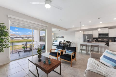 Living Room with Lake View #Disney #Parks #kingdom #springs #StoreyLake #resort #Apartment #Vacation #Rental #waterpark #Kissimmee #Orlando #universal #citywalk
