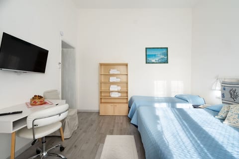 Quadruple Room | Egyptian cotton sheets, premium bedding, memory foam beds, desk