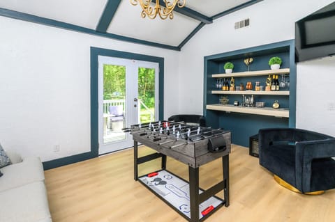 Interchangeable pool table, comes with hockey, foosball, pingpong and more. 