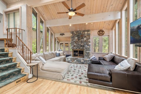 Relax around the cozy fireplace with ample seating 
