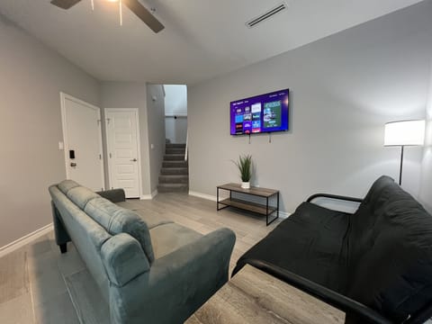Living Room with Smart TV and Futon