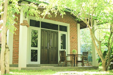 Deluxe Triple Room, Garden View | Desk, laptop workspace