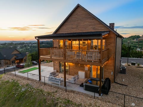Dream View is a spacious four-bedroom Branson vacation rental with panoramic Table Rock Lake views, a private hot tub, and room for 10 guests.