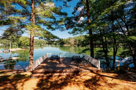 Shared Lakeside Deck: Enjoy serene views and gather around with friends on the spacious sunlit deck!