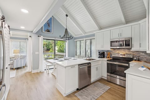 Step into a world of contemporary elegance as you enter this newly renovated haven. The interior has been thoughtfully redesigned in 2024, boasting a seamless blend of modern amenities and classic charm.