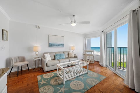 Livingroom with a beautiful gulf view and a comfy Sleeper Sofa