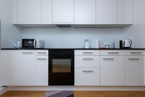 Equipped with Nespresso coffee machine, kettle, microwave oven and toaster.