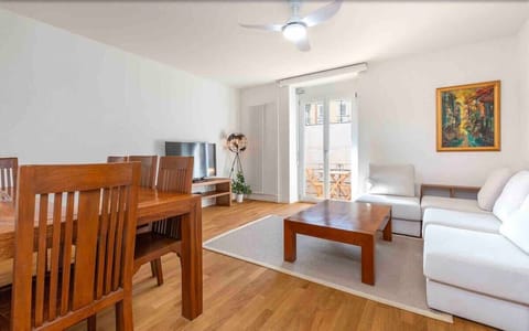 Spacious and bright living room with a comfortable European sofa set and a ceiling fan (which is a rare gem during summer). 
