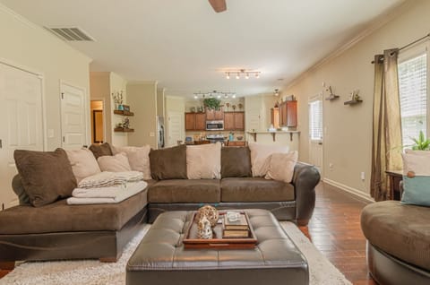 "Enjoy a fun-filled evening in our spacious living room."

