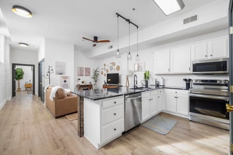 Cook your favorite meals in this fully equipped kitchen with all new appliances and stylish finishes.