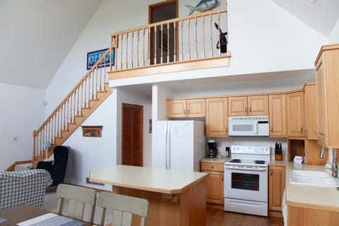 Open loft-style layout keeps everyone connected.