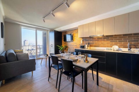 Experience urban living with stunning city views from your private balcony in this stylish studio apartment.
