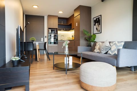 Cozy living area with modern amenities and stylish decor, perfect for relaxation and entertainment.