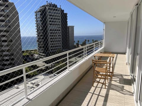 Relax on the private balcony with stunning ocean views, perfect for morning coffee or evening sunsets.