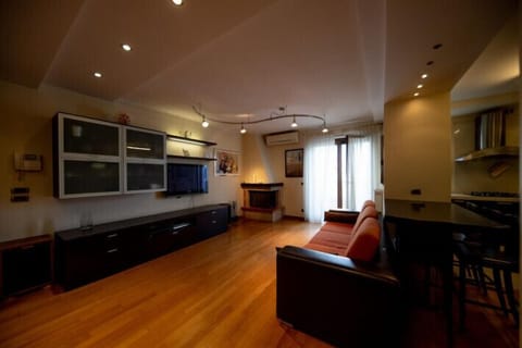 Apartment | Living area | 35-inch flat-screen TV with digital channels