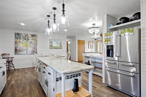 Full kitchen equipped with all essential cooking and eating needs.