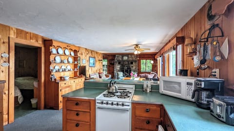 The kitchen overlooks the dining and living space