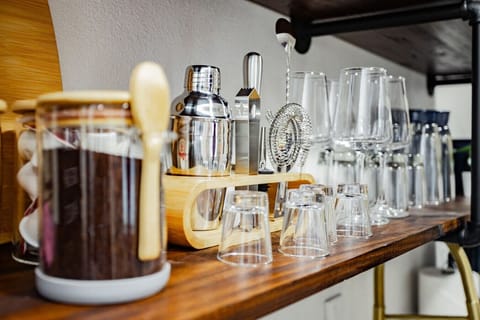 Cocktail Corner: Mix up your stay with our sleek bar setup for memorable evenings!
