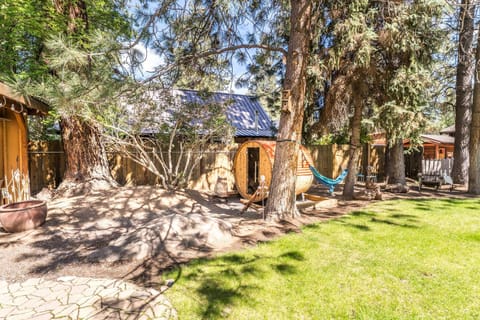 Unwind in the beautiful backyard where you’ll find ample grassy area & seating.