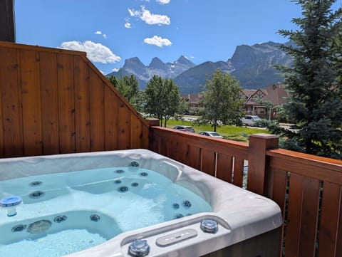 Take in spectacular mountain scenery from your private hot tub!