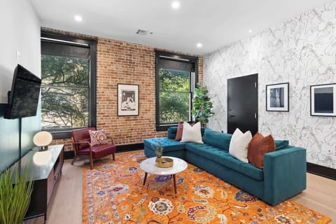 Relax in the living area with a smart TV, stylish seating and a sleeper sofa for extra guests. Perfect for families or group stays in New Orleans, this inviting space is ideal for movie nights or recharging after a day in the city.